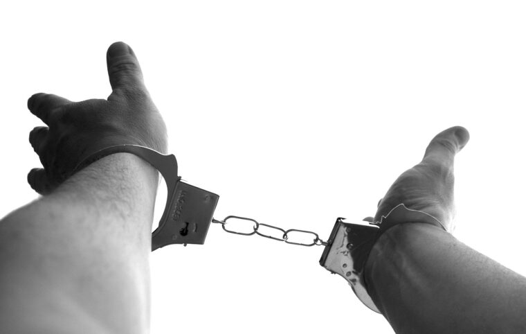 handcuffs, prisoner, crime-921290.jpg